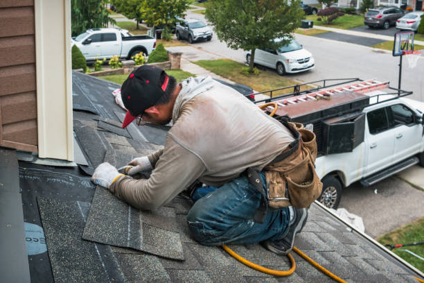 Professional Flat Roof Repair technician working in Hallandale, FL